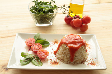 Cuban style rice on a white plate elongated