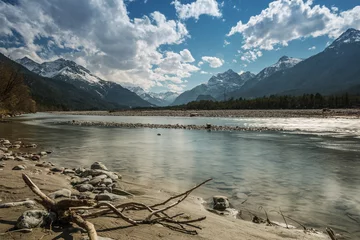 Foto op Canvas sand bank and stony river lech at tirol mountains  with blue sky © A2LE