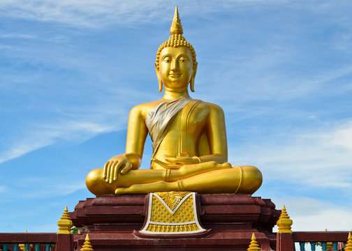 Golden buddha statue at Lam Por temple in Songkhla, Thailand
