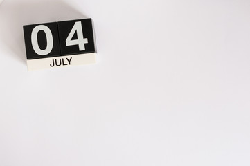 July 4th. Image of july 4 wooden color calendar on white background. Summer day. Empty space for text. Independence Day Of America