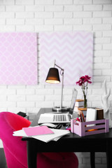 Workplace with laptop on table at home