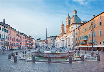 ROME, ITALY - MARCH 12, 2016: Piazza Navona in morning and Fountain of Neptune (1574) created by Giacomo della Porta and Santa Agnese in Agone church - obrazy, fototapety, plakaty
