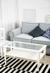 Living room interior with sofa and table
