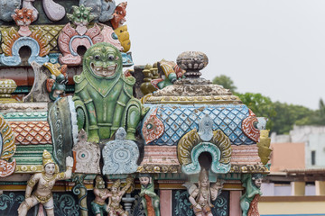 Trichy, India - October 15, 2013: Closeup of  green monster statue on Gopuram at Shrirangam temple. Often associated with Makara, the Hindu sea monster
