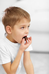 Portrait of cute cheerful boy