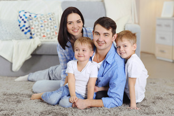 Family concept. Happy family together in the room