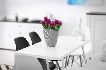 Beautiful comfortable modern interior with table and chairs