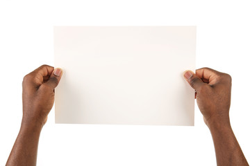 Male hands holding sheet of paper isolated on white
