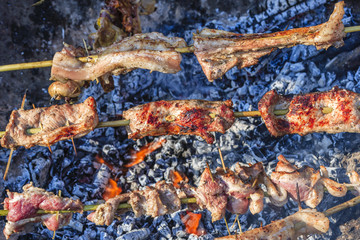 Grilling meat with barbecue stuff