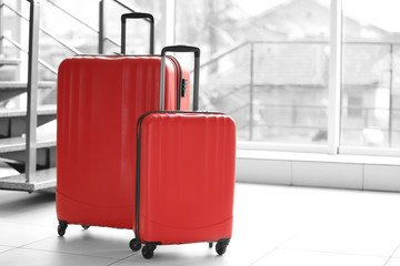 Red suitcases indoors