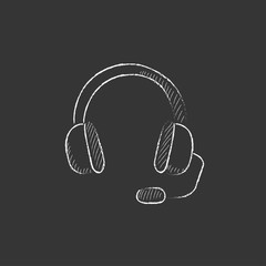 Headphone with microphone. Drawn in chalk icon.