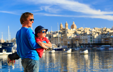 father and son playing on the quay of Valetta, Malta