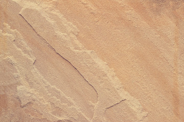 Naklejka na ściany i meble Texture brown sand stone for background
