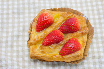 Homemade cup cake with fresh strawberries