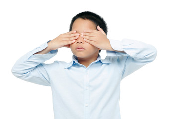 Kid covering his eyes