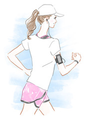 音楽を聴きながらランニングする女性