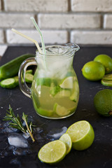 Cold lemonade with lime, cucumber and rosemary 
