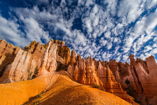 Bryce Canyon scenery, profiled on deep blue sky with clouds