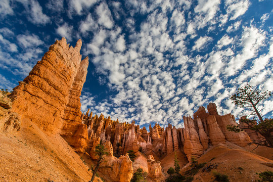 Bryce Canyon scenery, profiled on deep blue sky with clouds