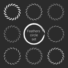 Feathers circle set white isolated on the black background