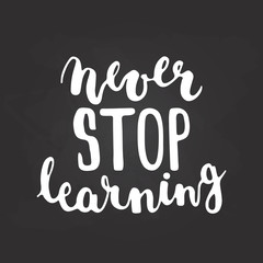 Hand drawn chalk typography lettering phrase Never stop learning isolated on the black chalkboard background. 