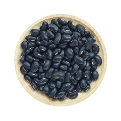 Black beans in wooden bowl isolated on white background