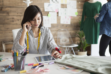 Women designers have a phone in the office