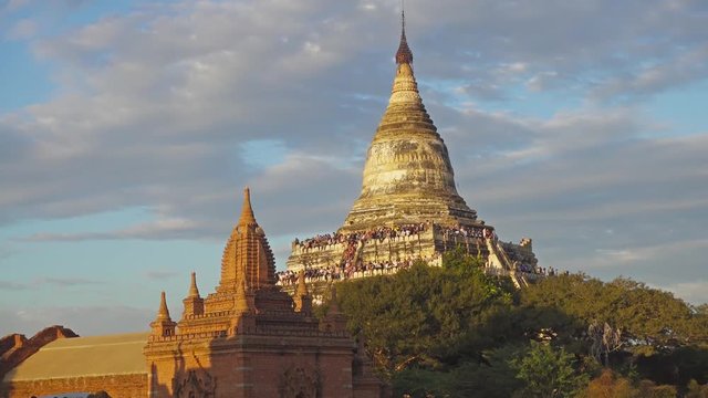 Tourists are greeted sunset at the Shwesandaw Pagoda (Paya) in Bagan, Myanmar (Burma) 4k
