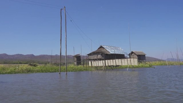 Stilted houses in village on famous Inle Lake 4k
