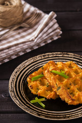 Potato waffles with green onion and paprika 