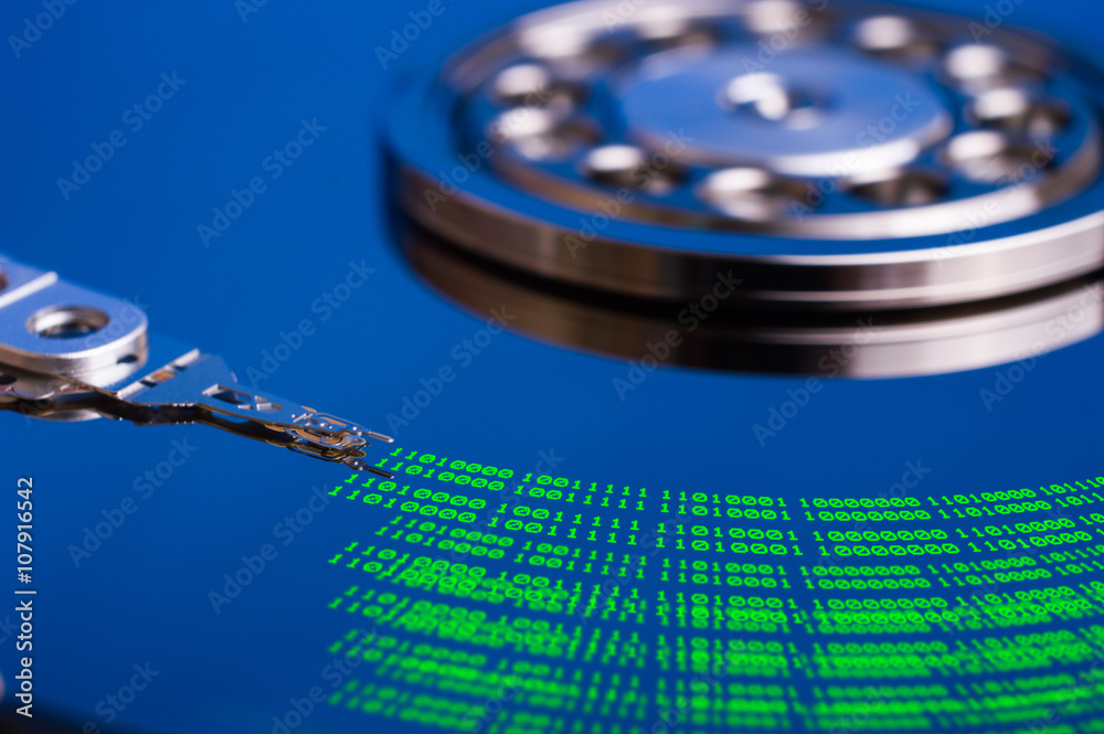 Fototapete hard disk and binary code