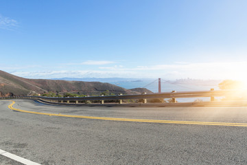 highway with Golden Gate Bridge background