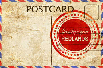 redlands stamp on a vintage, old postcard