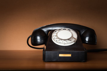 Retro telephone on table