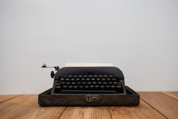 Old retro typewriter on table