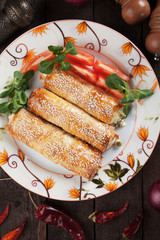 Baked phyllo pastry rolls