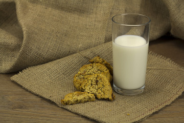 Cookies and milk on a rustic background