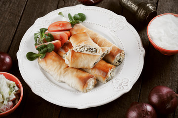 Phyllo pastry rolls with cheese and spinach