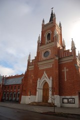 Obraz premium Red Catholic church in the Ukraine in Kharkov.