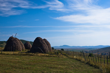 Pešter plateau panoramic landscape with haystacks and meadows in southwest Serbia