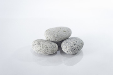 Fototapeta na wymiar Round zen stones isolated on a white background