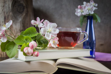 Books, flowers and cup of tea