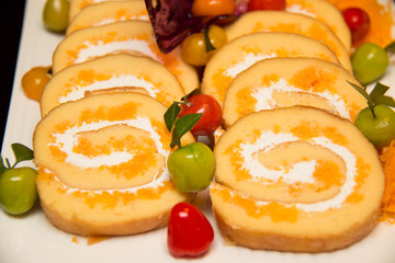 vanilla  roll cake on a plate