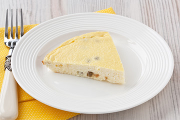 Cottage cheese casserole / Cottage cheese casserole with raisins and semolina on wooden background