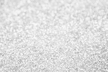 Abstract silver background with metal glitter. The texture.