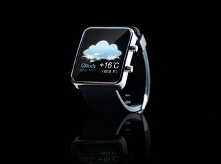 close up of black smart watch with weather app