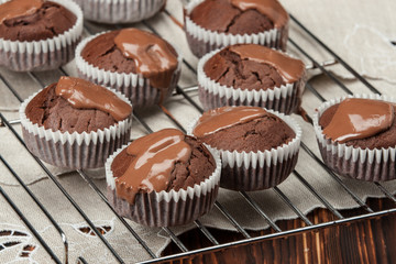 Homemade Cocoa Muffins With Chocolate Cream. Natural Linen Napki