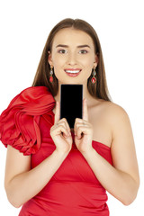Naklejka premium Pretty brunette showing smart phone on white background