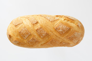 French baguette on a white background with space for text. product of flour. Bread long form. flat location a food on a white background. view from above