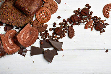 Many different chocolates and cookies